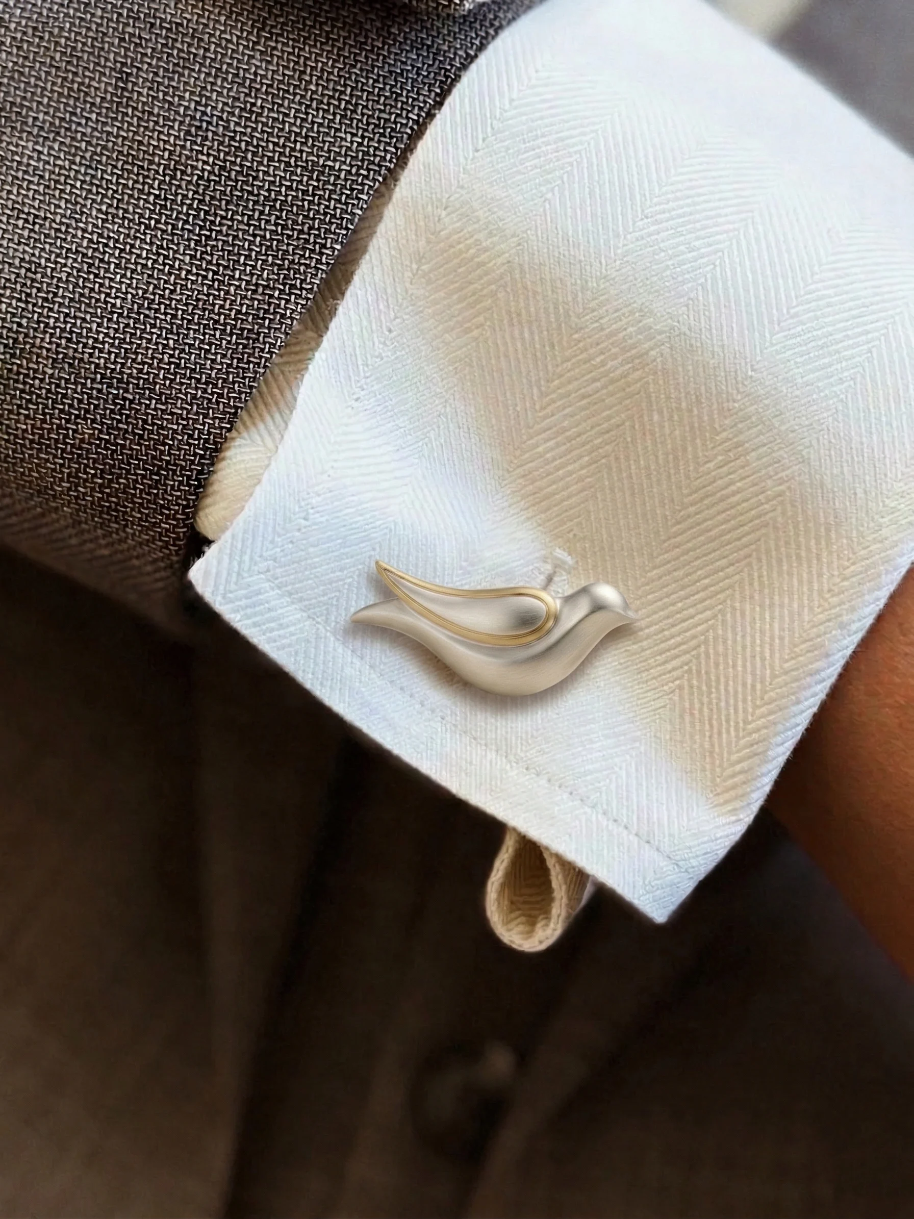 Marlet cufflink worn on a cuff