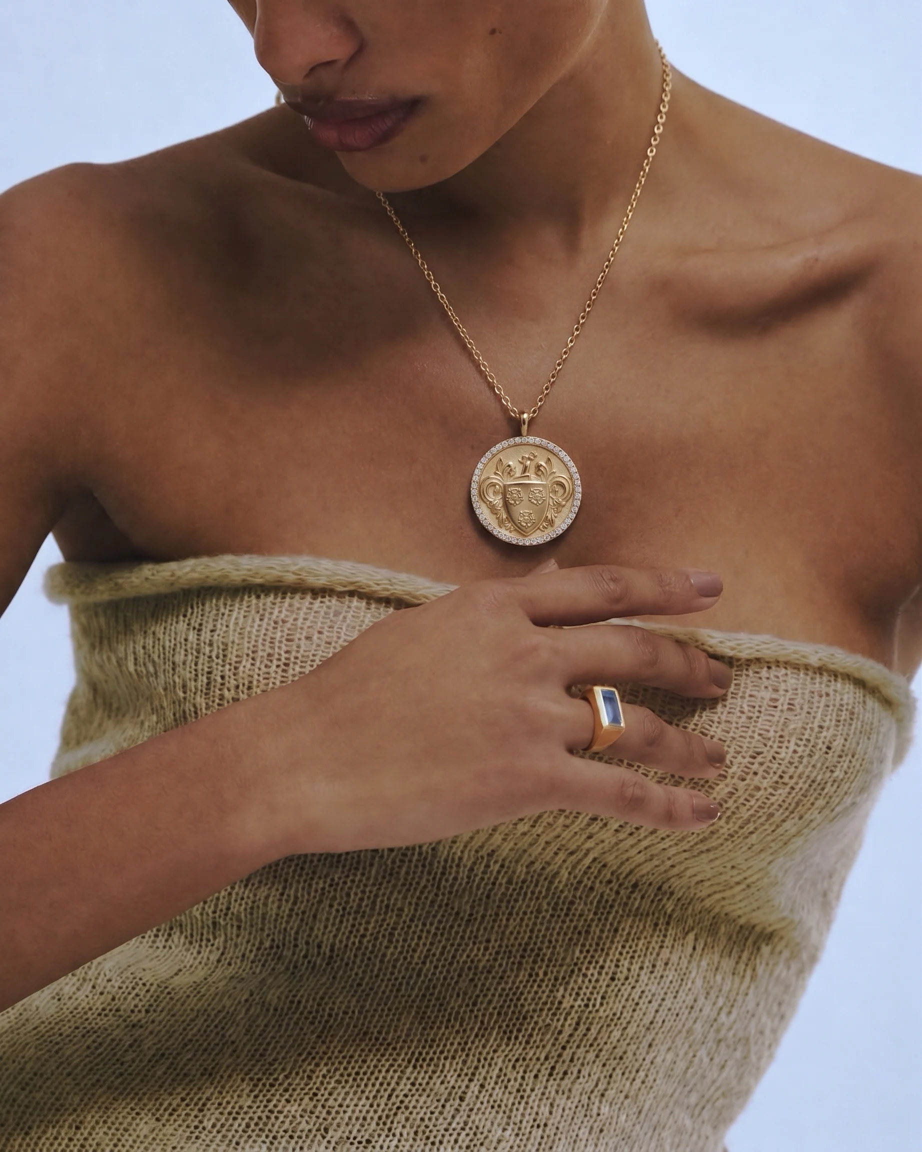 Westover seal medallion worn on a model