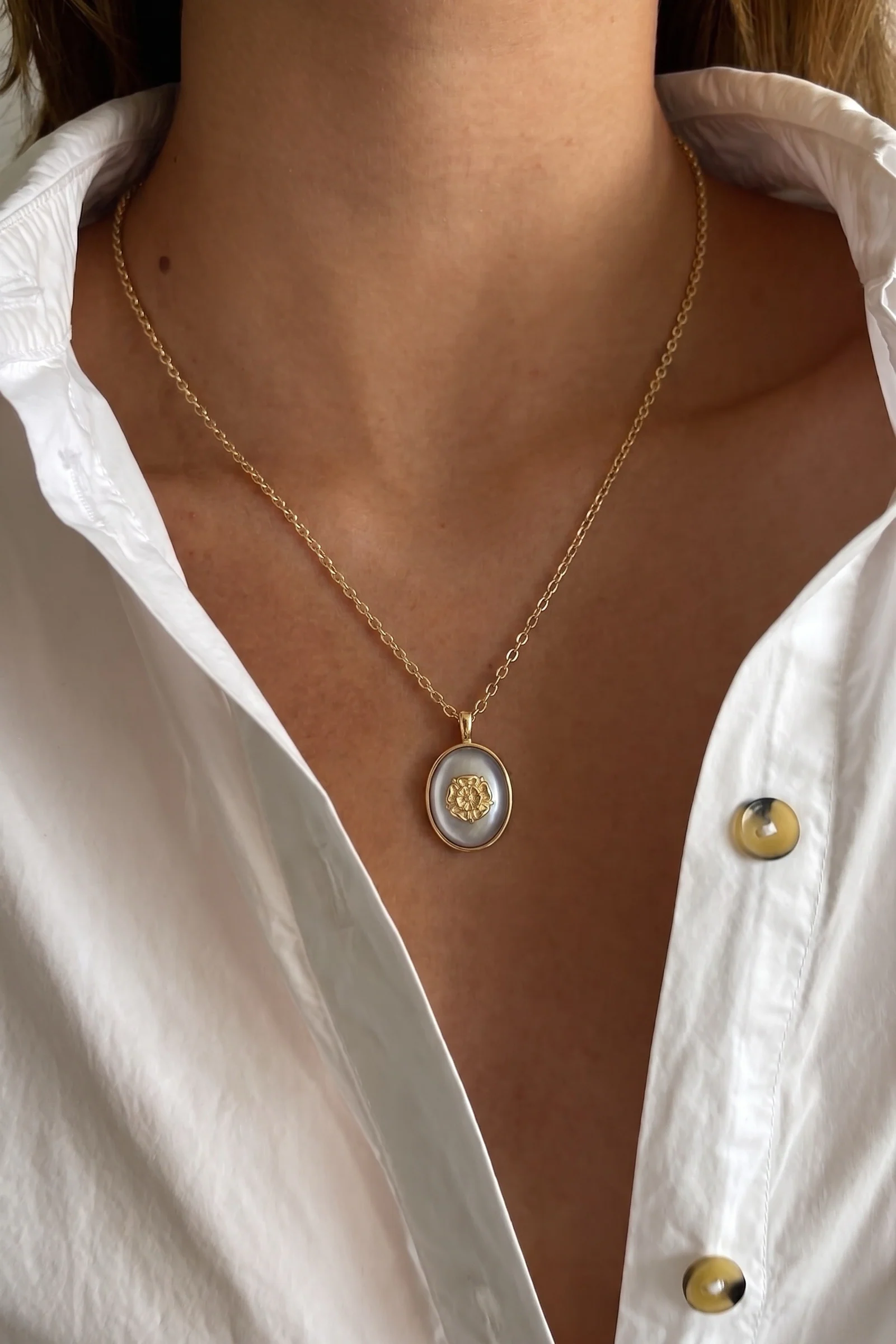 Tudor rose necklace worn on a model